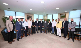 ANASİAD HEYETİ, BTSO BAŞKANI İBRAHİM BURKAY'I ZİYARET ETTİ
